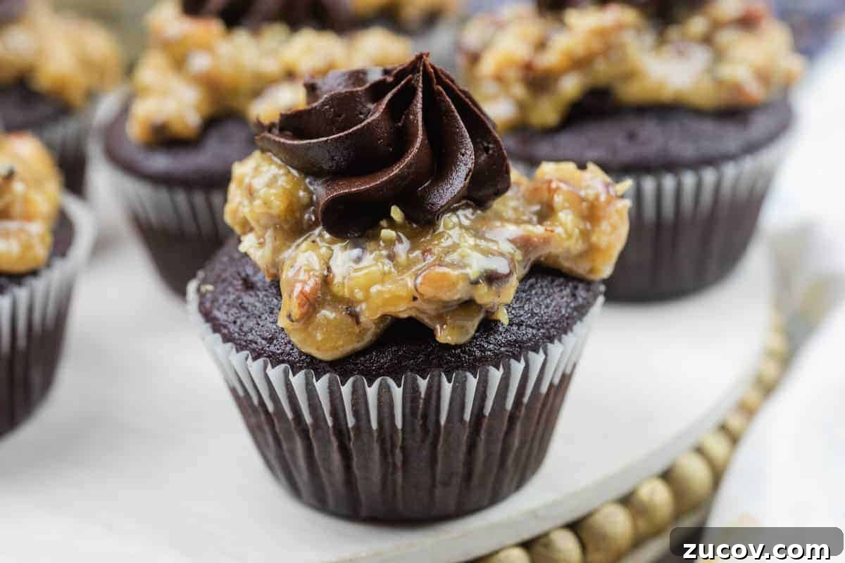 33 Irresistible Fall Desserts That Defy Portion Control 28 Close-up of German chocolate cupcake topped with coconut-pecan caramel and a swirl of chocolate buttercream.