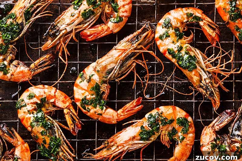 Prawns vs Shrimp: Key Differences, Uses, and How to Tell Them Apart 6 Horizontal image of grilled and seasoned prawns.