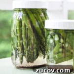 Crisp Quick Pickled Asparagus Recipe for Flavorful Snacks 5 Two jars of quick pickled asparagus.
