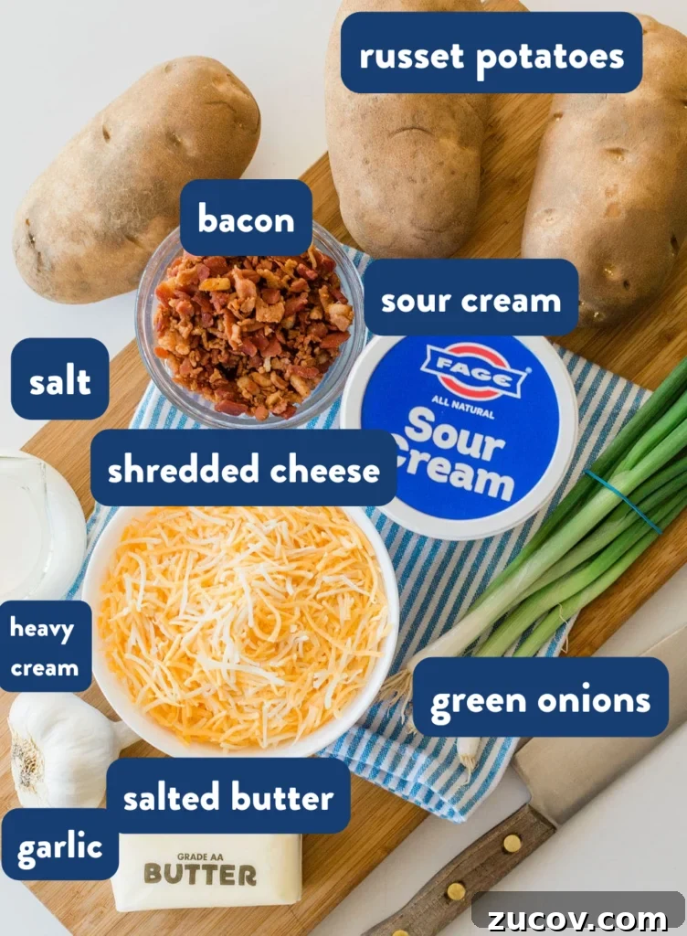 Creamy Loaded Mashed Potato Casserole with Bacon and Cheddar 4 Fresh Ingredients laying on a brown wooden cutting board