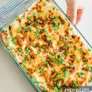 Creamy Loaded Mashed Potato Casserole with Bacon and Cheddar 9 casserole dish with mashed poatoes
