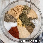 Savory Smoked Turkey Rub Recipe for Bold, Crispy Flavor 9 Overhead shot of a bowl full of spices, to make a Smoked Turkey Rub Recipe.