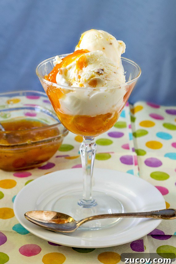 Sour Cream Peach Pie Ice Cream Recipe: Creamy Summer Dessert 2 Sour cream peach pie ice cream in a glass.
