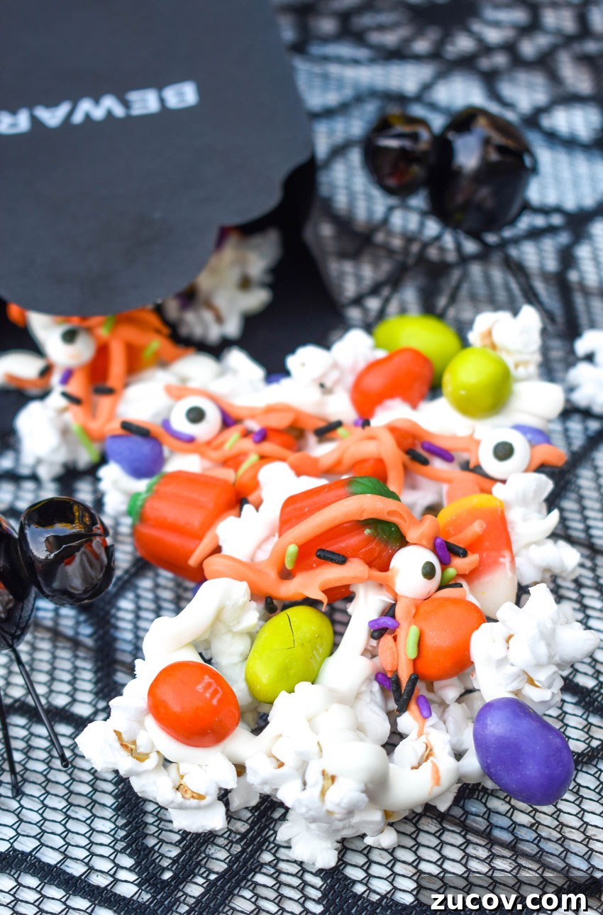 Monster Munch Snacks: Flavor Guide, Variants & Where to Buy 7 monster munch popcorn spilling out of a black treat bag