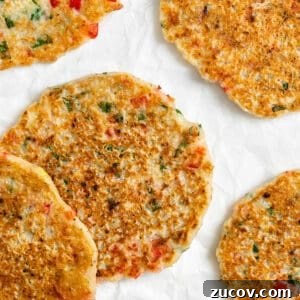 Crispy Vegan Potato Pancakes Recipe for Breakfast & Brunch 12 completed Vegan Potato Pancakes against a white surface