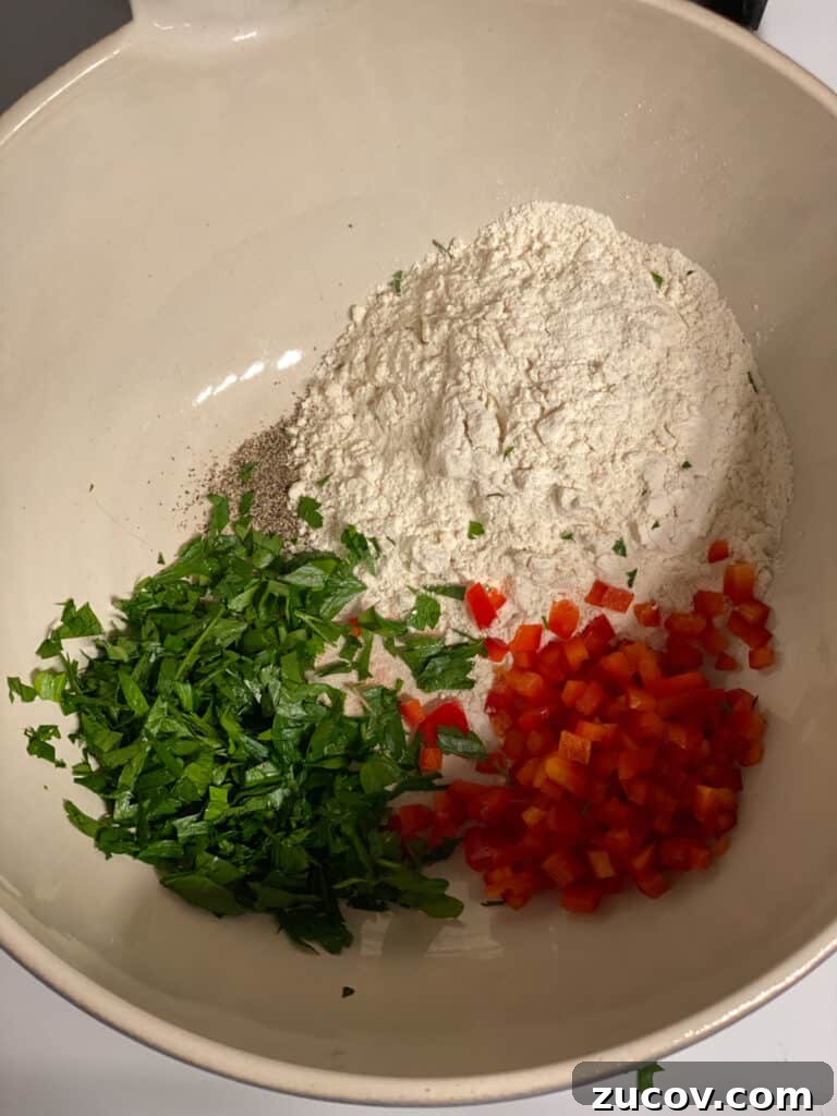 Crispy Vegan Potato Pancakes Recipe for Breakfast & Brunch 5 process shot of mixing ingredients together in a bowl