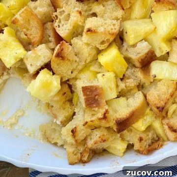 pineapple bread pudding with 1 portion taken out