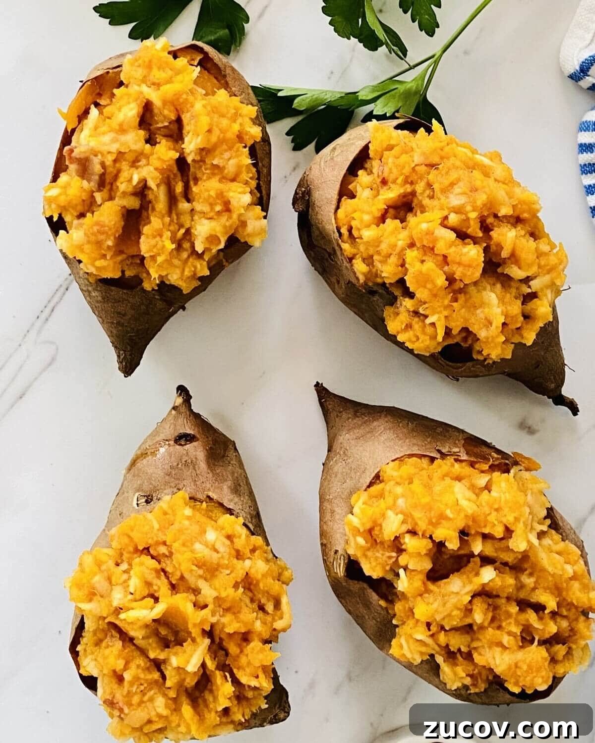 Apple and Bacon Stuffed Sweet Potatoes: Savory Autumn Recipe 8 Baked stuffed sweet potatoes with apples.