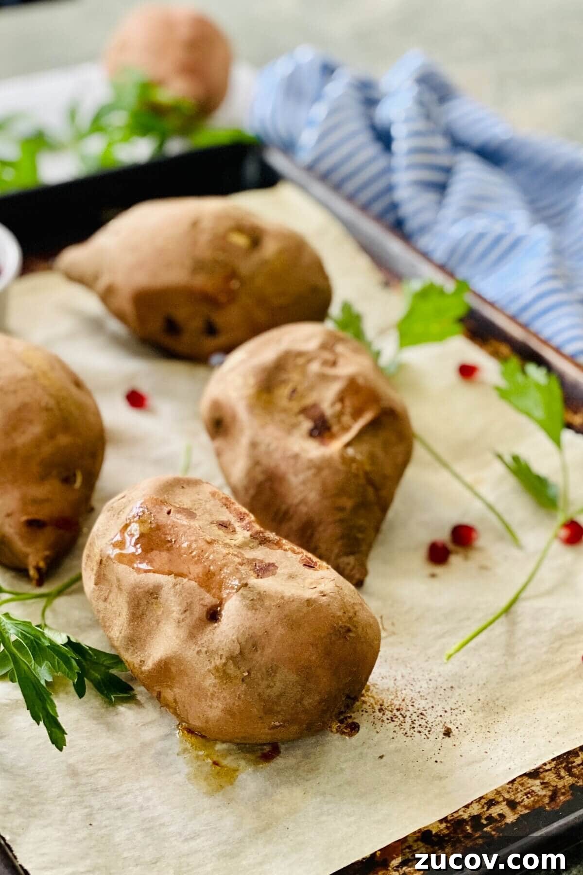 Apple and Bacon Stuffed Sweet Potatoes: Savory Autumn Recipe 10 Baked sweet potatoes on a baking sheet.