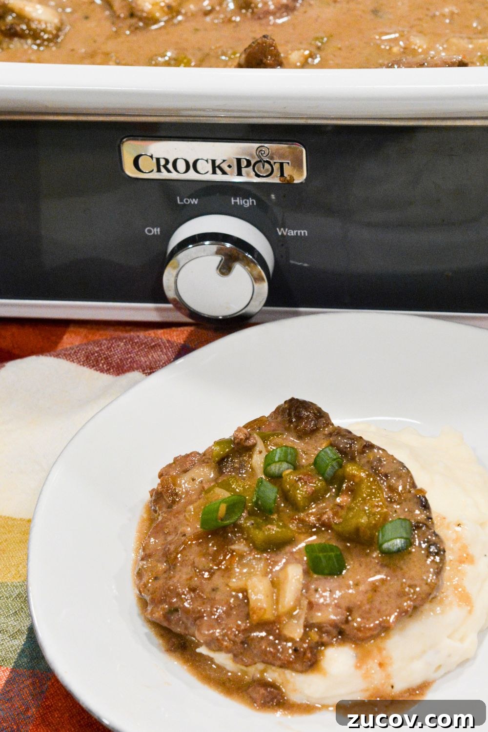 Slow-Cooker Cube Steak in French Onion Gravy 5 Easy Crock Pot Beef Cubed Steaks with Gravy recipe! Tender beef cube steaks cooked in a slow cooker with French onion soup, cream of mushroom soup, and vegetables. Serve over mashed potatoes for a comforting and delicious meal.