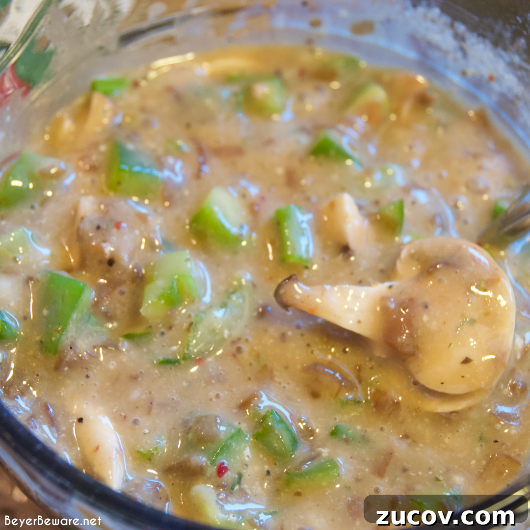 Slow-Cooker Cube Steak in French Onion Gravy 4 Crock pot beef cubed steak with gravy is a simple recipe that combines ranch and Italian seasoning and cream of mushroom soup and French onion soup with mushrooms, onions, and peppers for a tender cubed steak recipe that is perfect over mashed potatoes.