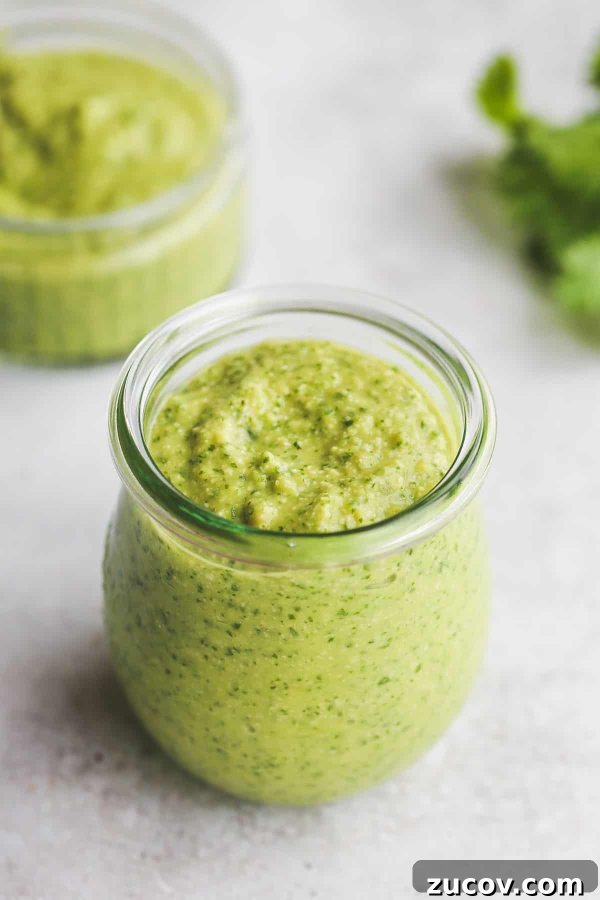 Creamy Avocado Cilantro Dressing Recipe for Salads & Tacos 5 Avocado Cilantro Dressing in a glass jar