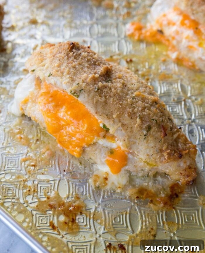 Double Cheese-Stuffed Chicken Breast Recipe for Dinner 4 Cheese oozing from chicken