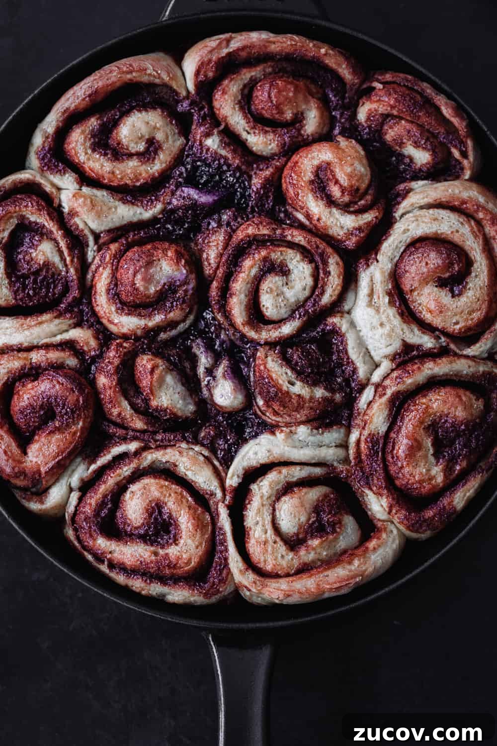 Cinnamon Rolls Made with Challah Dough: Soft, Buttery Recipe 4 Post oven and pre-icing overhead shot of cinnamon rolls just out of the oven.