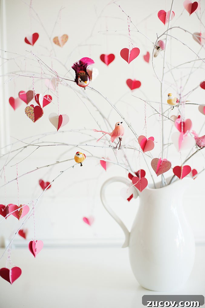 Branches decorated with hearts and birds emerging from a vase - a valentine craft