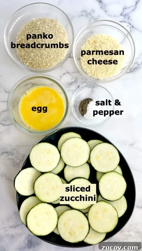 Crispy Air Fryer Zucchini Chips Recipe 3 air fryer zucchini ingredients on a table