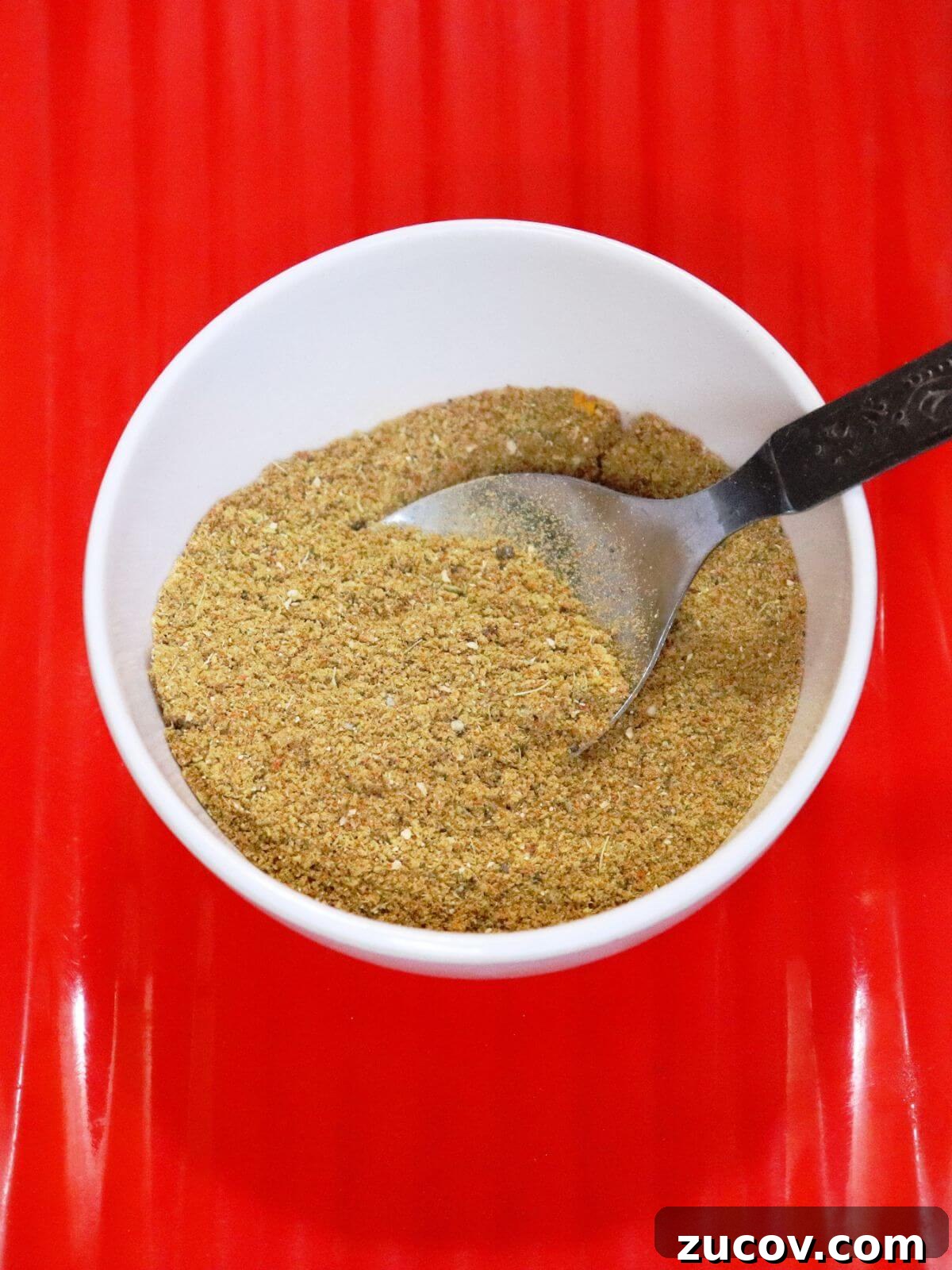 How to Make Homemade Curry Powder: Simple Recipe & Uses 2 close-up of homemade curry powder in a bowl.