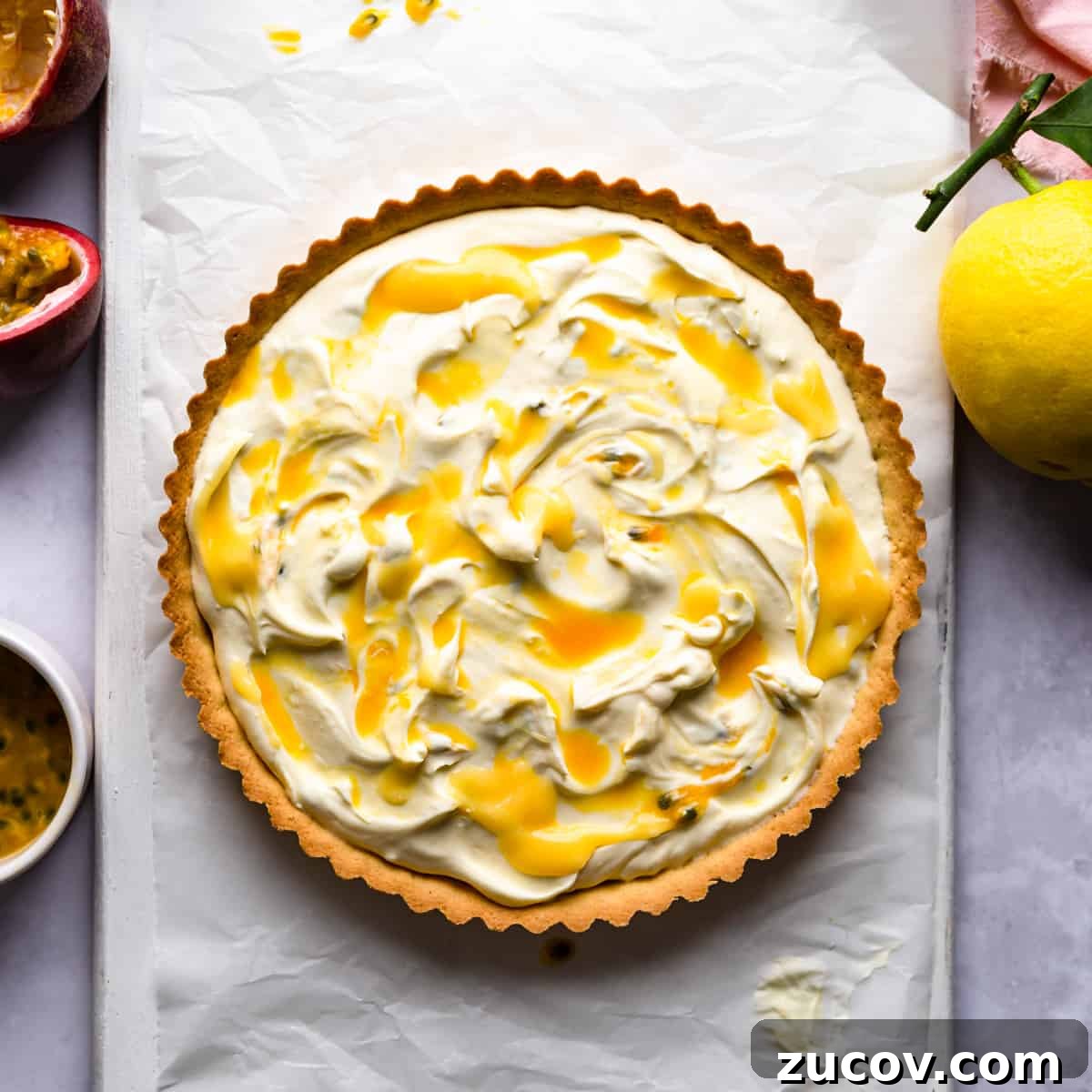 Zesty Lemon Mascarpone Tart Recipe for Creamy Citrus Dessert 6 pastry case filled with mascarpone and lemon curd.