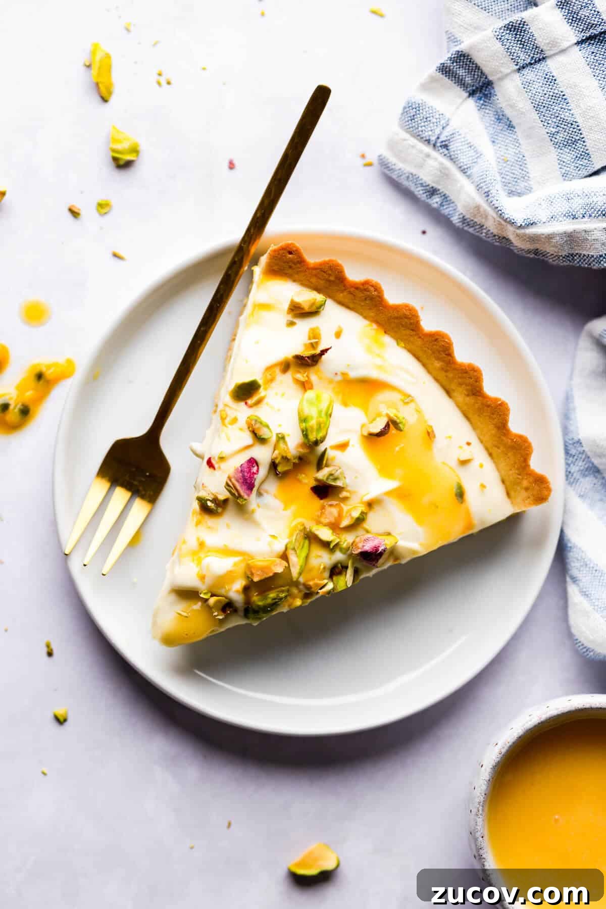 Zesty Lemon Mascarpone Tart Recipe for Creamy Citrus Dessert 9 top view photo of a slice of tart on a plate