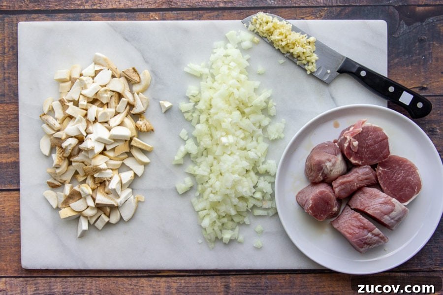 Juicy Pork Tenderloin with Creamy Mushroom Sauce Recipe 4 ingredients prepped for the pork in mushroom sauce