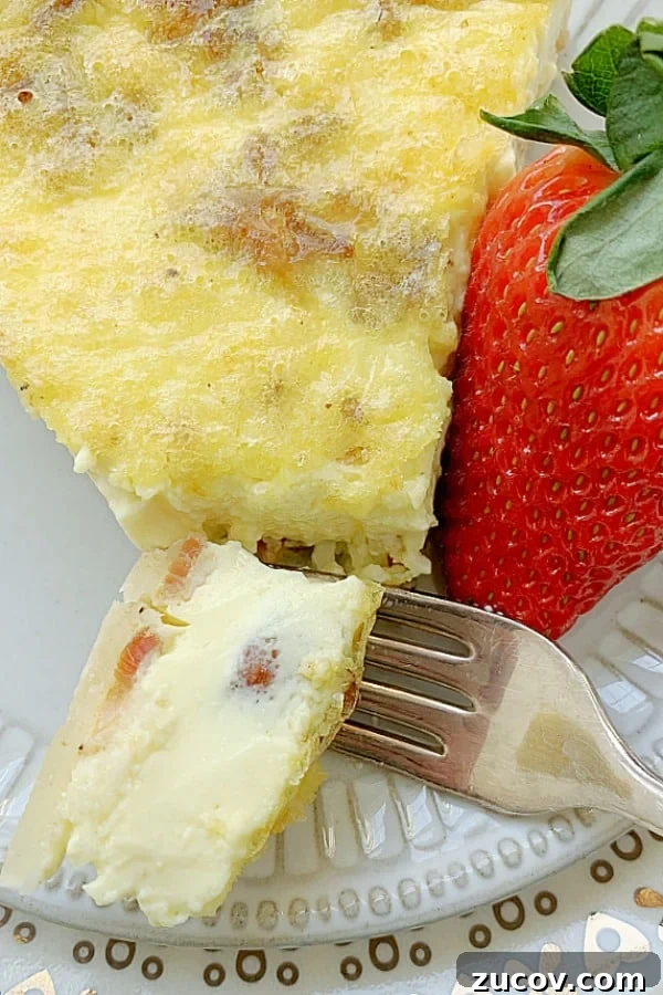 Classic Quiche Lorraine Recipe: Creamy Bacon and Gruyère Pie 6 bite of quiche lorraine