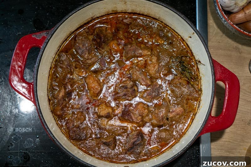 Classic Old-Fashioned Beef Stew Recipe (No Wine) 10 Simmering beef stew