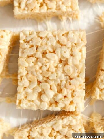 Rice krispie treats on a white background.
