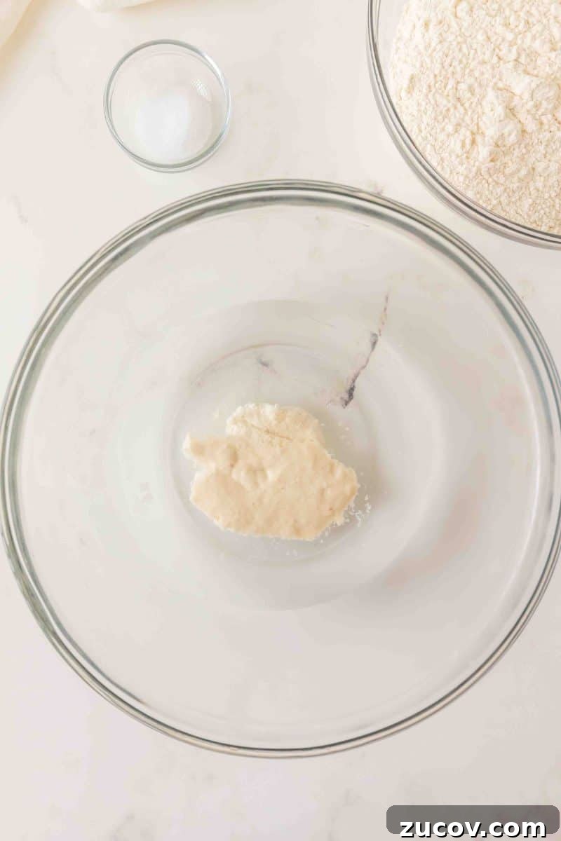 Sourdough Cinnamon Raisin Bread Recipe — Soft, Sweet & Spiced 4 Sourdough starter in a mixing bowl. Hostess At Heart