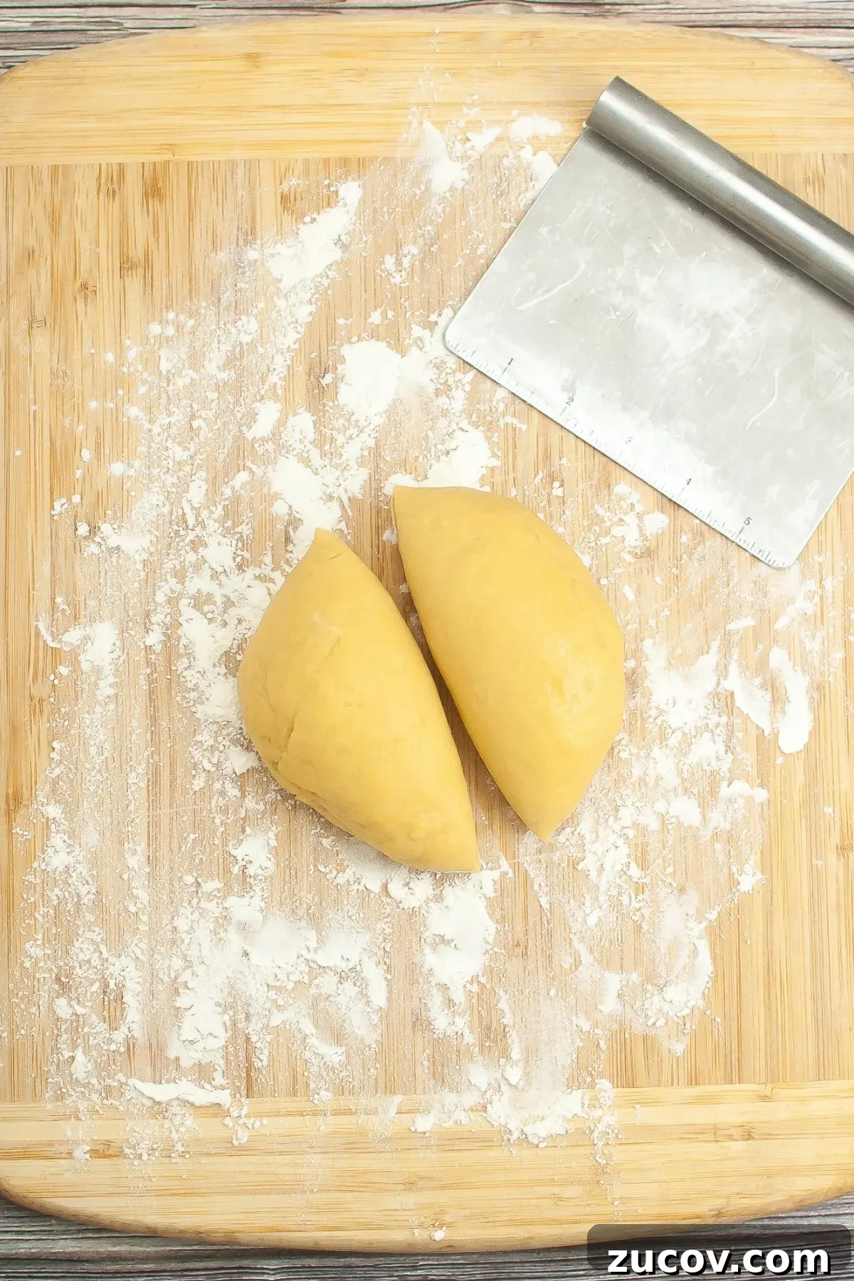 Homemade Gluten-Free Fettuccine Recipe for Perfect Pasta 6 A ball of pasta dough cut into two.