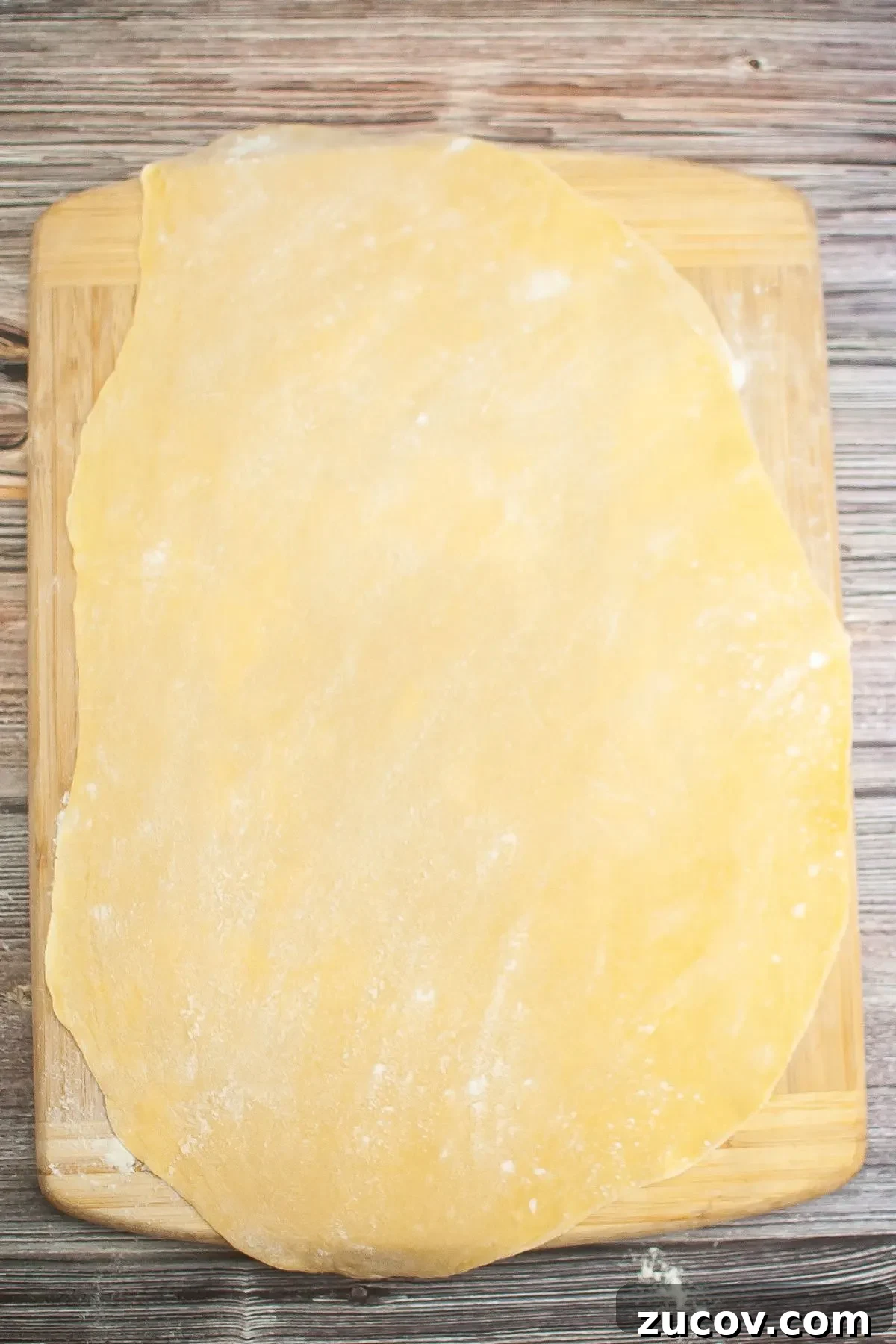 Homemade Gluten-Free Fettuccine Recipe for Perfect Pasta 7 Rolled out gluten free pasta dough.