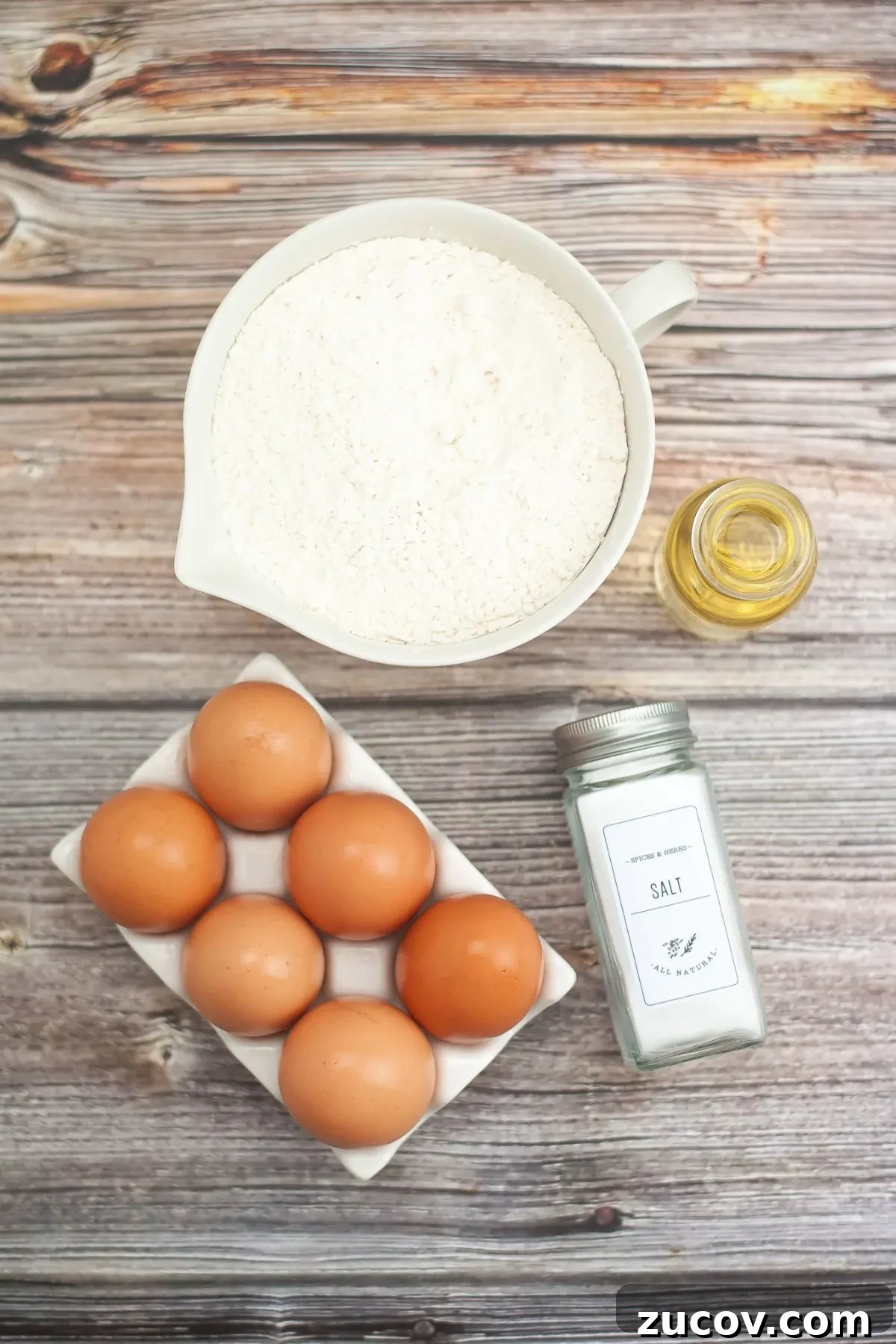 Homemade Gluten-Free Fettuccine Recipe for Perfect Pasta 3 Ingredients needed to make homemade gluten free fettucinne, gluten free pasta flour, eggs olive oil, and salt.