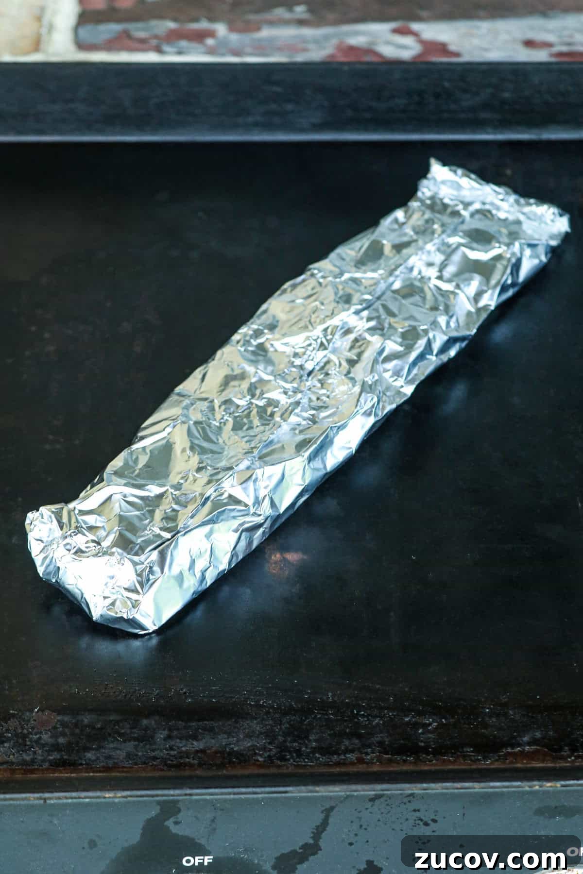 Grilled Green Beans in Foil Packets: Simple Camping Side Dish 4 Foil packet on griddle.