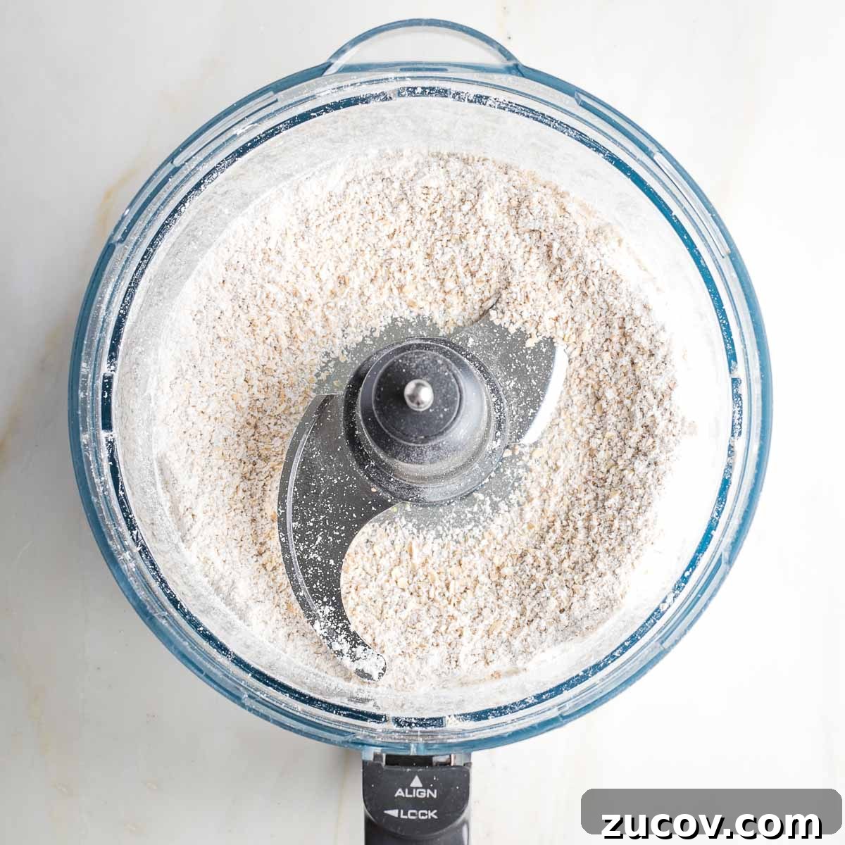 Vegan White Bean Blondies: Chewy, Protein-Packed Treats 6 Rolled oats ground into oat flour in the bowl of a food processor.