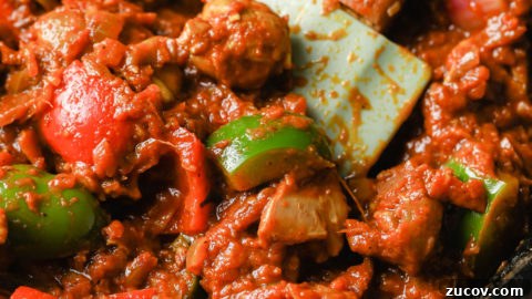 Authentic Chicken Jalfrezi Recipe: Spicy Tangy Curry at Home 19 Chopped bell peppers sauteed in with cooked boneless chicken