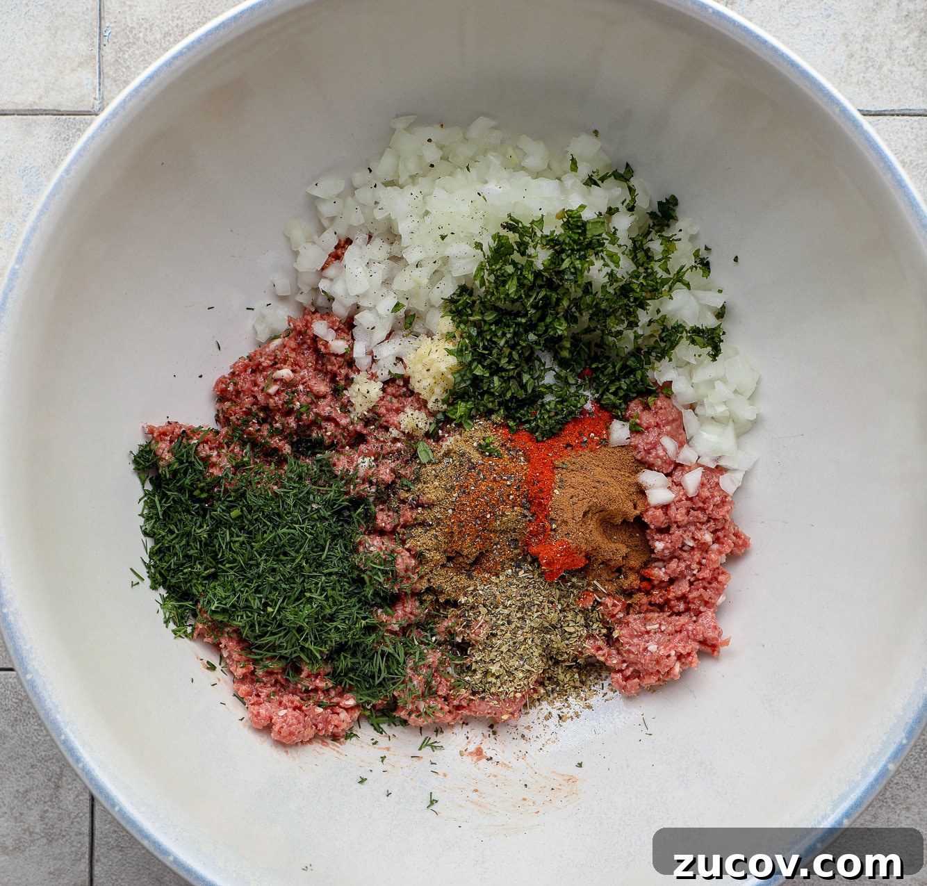 Vegan Kofta Recipe: Flavorful Plant-Based Meatballs 5 the ingredients for vegan kofta in a large white bowl.