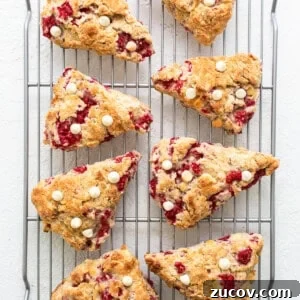 White Chocolate and Raspberry Scones Recipe for Brunch 12 Cranberry scones on a cooling rack.