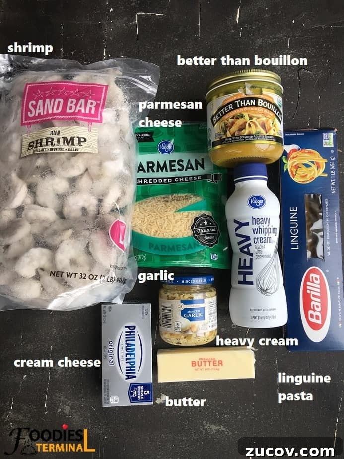 Instant Pot Shrimp Alfredo Recipe — Creamy 20-Minute Dinner 4 recipe ingredients on a black surface