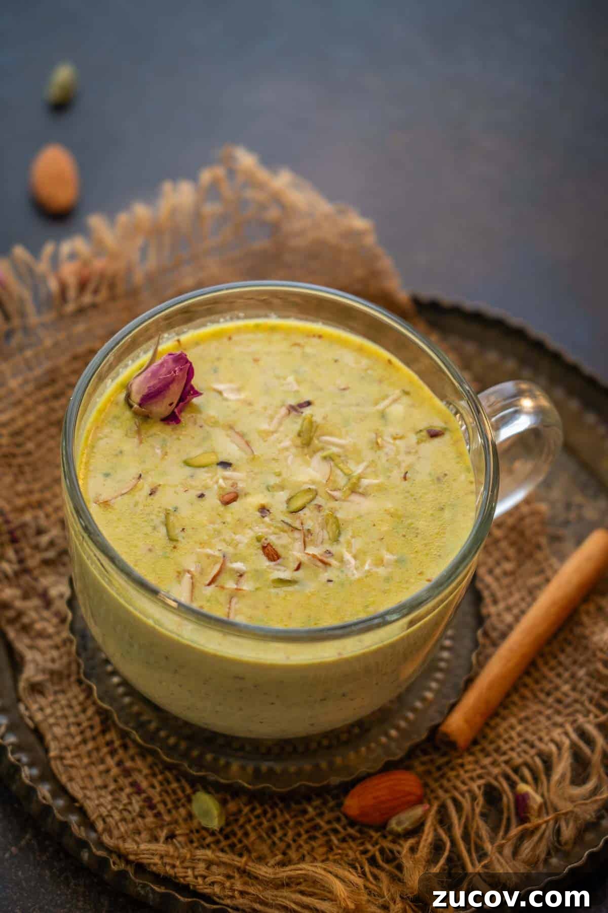 Masala Doodh (Spiced Indian Milk) Recipe — Creamy Cardamom Saffron Milk 2 Masala milk served in a cup.