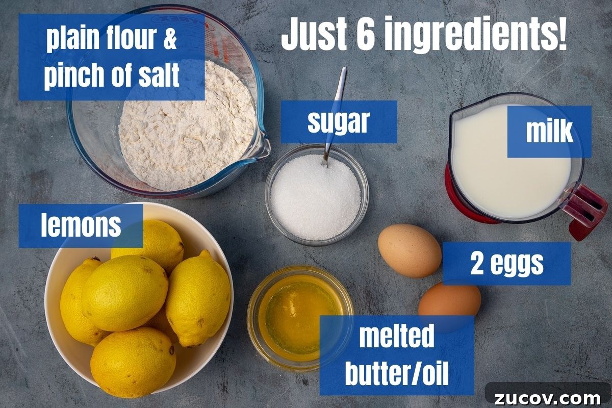 Crisp Lemon Sugar English Pancakes Recipe 3 All 6 ingredients needed to make English pancakes with sugar and lemon labelled on a blue background