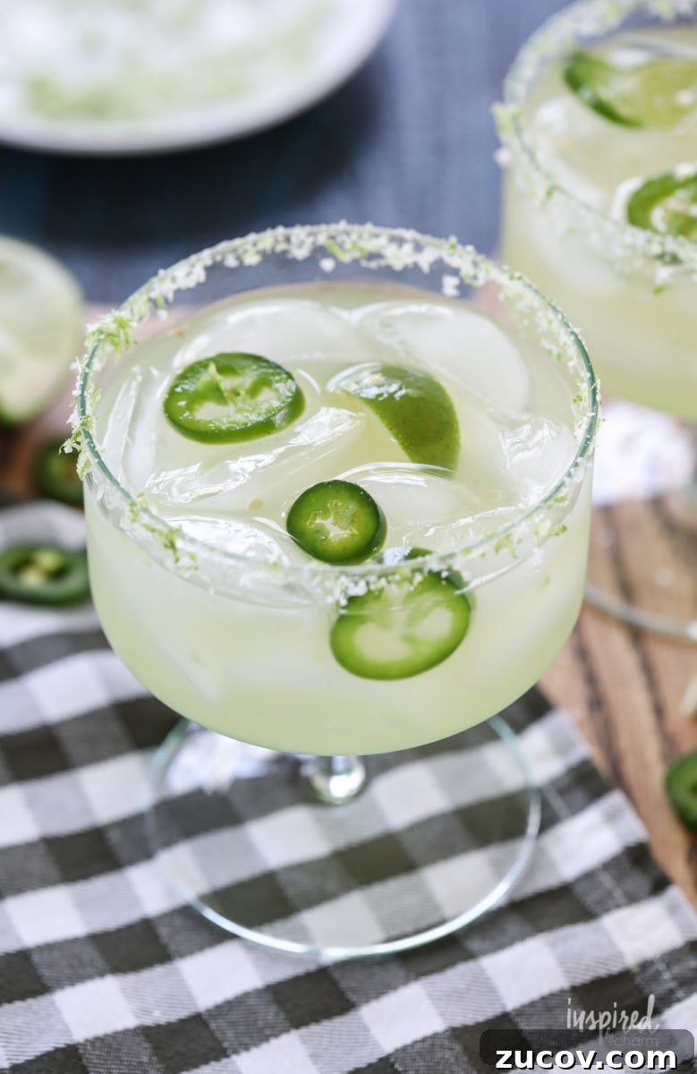 Spicy Jalapeño Margarita Recipe: How to Make It at Home 6 jalapeño margaritas in glasses.