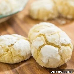 Chewy Lemon Crinkle Cookies Recipe for Bright Citrus Flavor 11 Three Lemon Christmas Cookies On A Dark Wooden Cutting Board