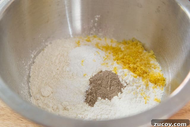 Chewy Lemon Crinkle Cookies Recipe for Bright Citrus Flavor 4 Dry Ingredients For Lemon Crinkle Cookies With Flour, Baking Powder, Cardamom, Sugar, Salt, Lemon Zest