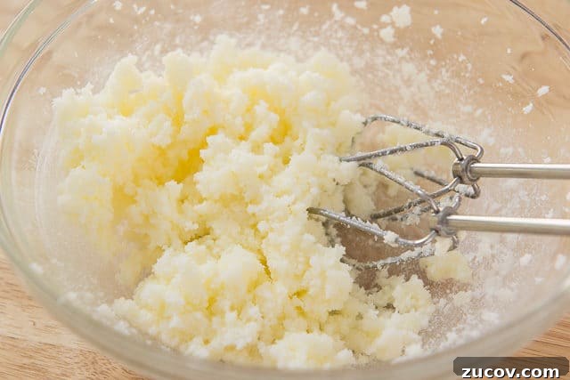 Chewy Lemon Crinkle Cookies Recipe for Bright Citrus Flavor 5 Creamed Butter And Sugar In Duralex Glass Mixing Bowl With KitchenAid Hand Mixer Beaters
