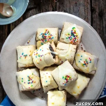 Gluten-Free Italian Fig Cookies Recipe for Authentic Flavor 10 Italian fig cookies on a plate with sprinkles.