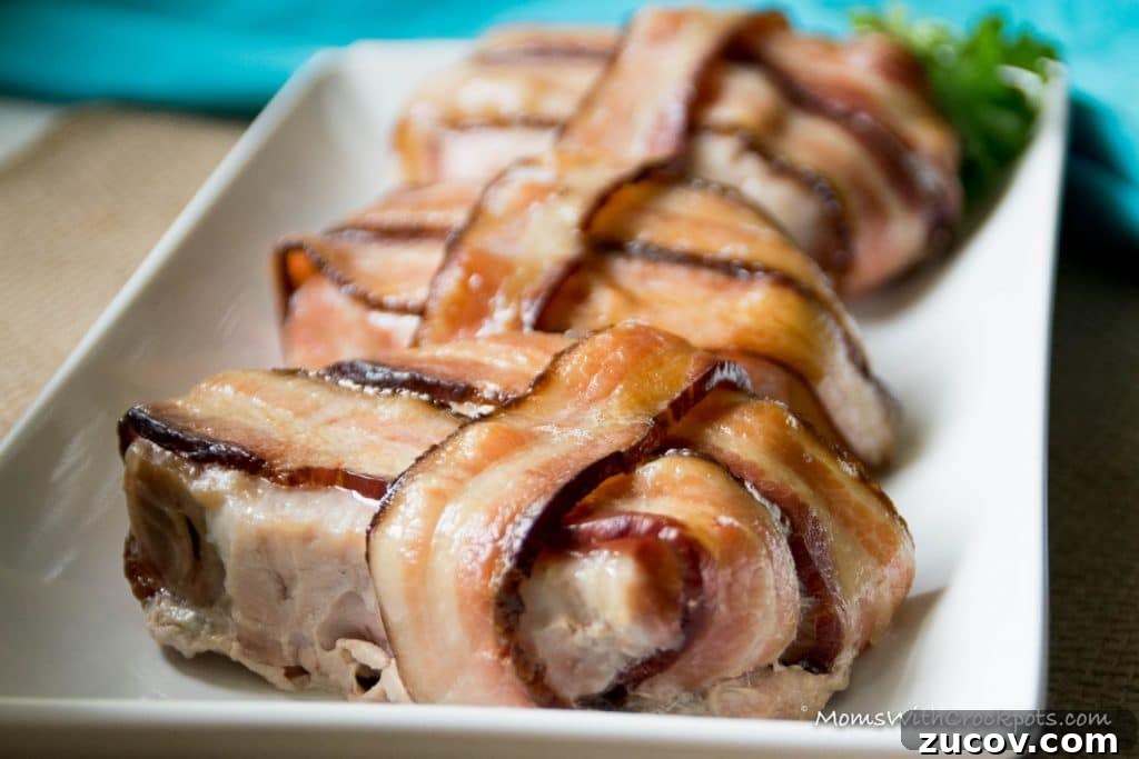 Slow-Cooker Bacon-Wrapped Pork Chops with Savory Glaze 9 A dinner that will leave them asking for more! This simple Crockpot Bacon Wrapped Pork Chops Recipe is a keeper!