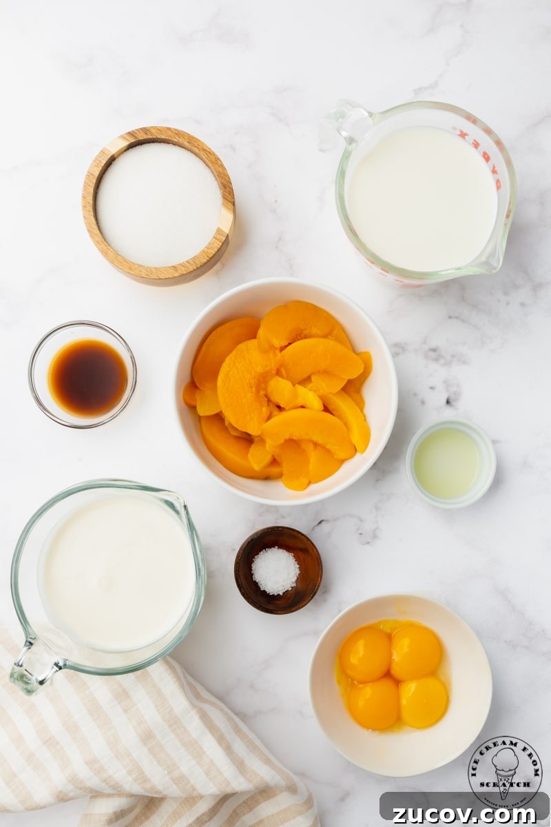 Homemade Peaches and Cream Ice Cream Recipe 3 a bowl of sliced peaches, along with the other ingredients needed to make peaches and cream ice cream from scratch. All are measured into bowls on a marble counter top