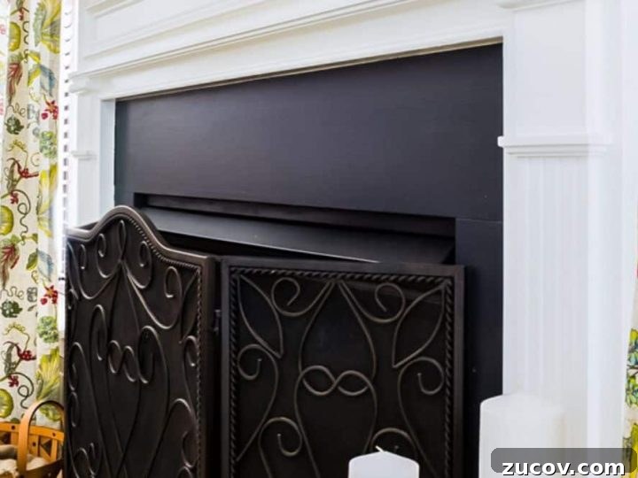 Close up view of painted fireplace surround