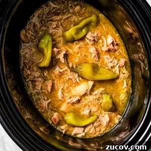 Mississippi Chicken Recipe: Slow Cooker & Oven Methods 4 Overhead view of Mississippi chicken inside the slow cooker.
