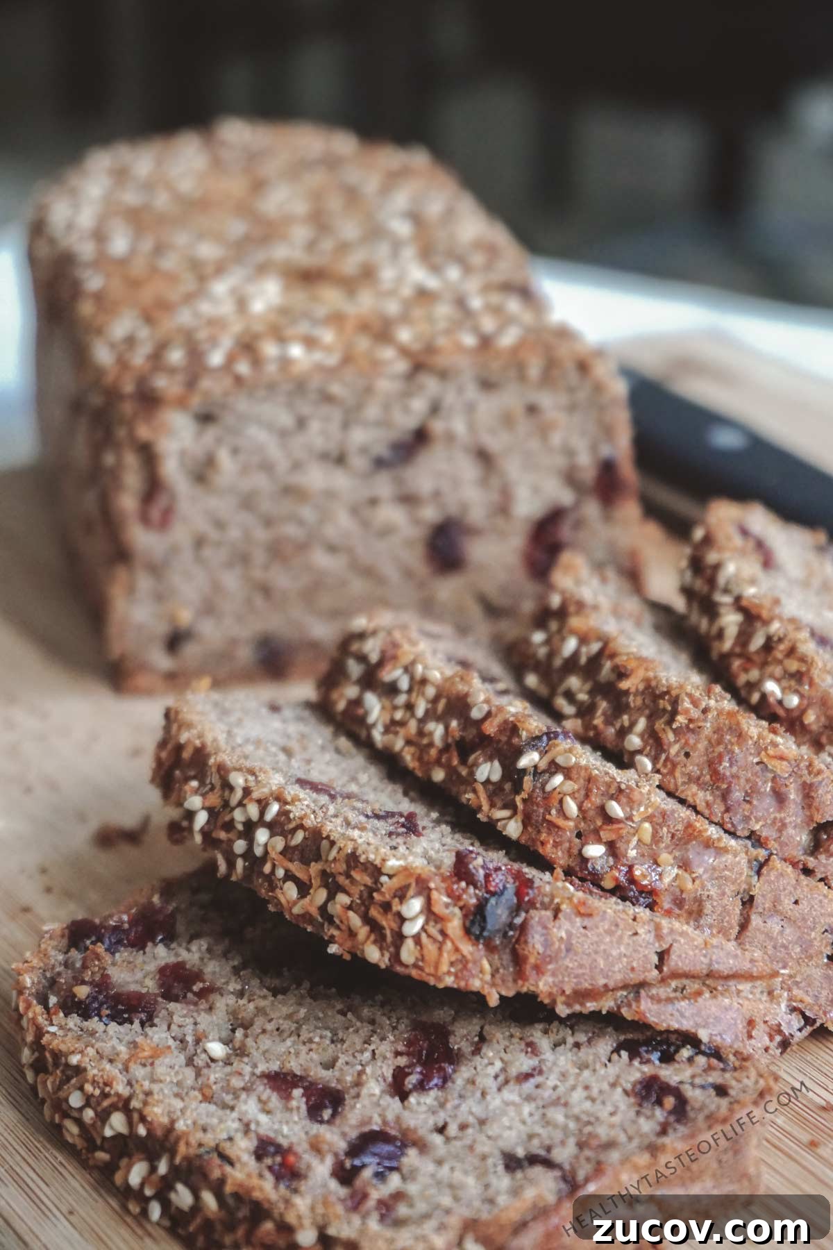 Vegan Gluten-Free Sourdough Banana Bread — Moist Recipe 2 gluten free banana bread sliced after baking showing crumb
