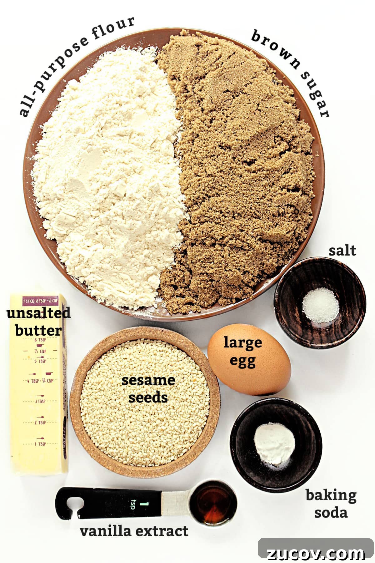 Sesame Benne Wafers: Crispy South Carolina Cookie Recipe 3 Benne Wafer ingredients with labels: flour, brown sugar, salt, egg, sesame seeds, baking soda, vanilla, butter.